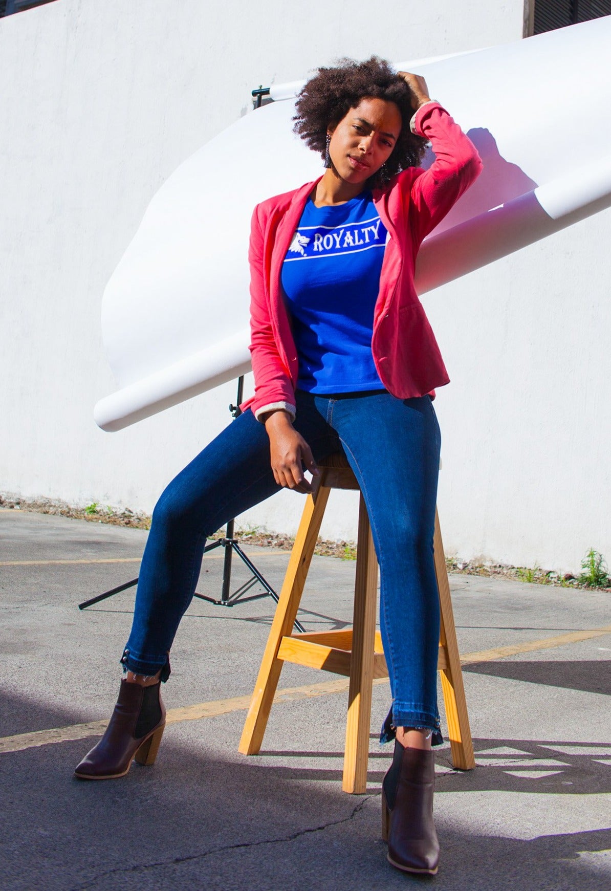Model View #2 - Female Model showcasing the front of the Royalty T-shirt in a glamor shot.